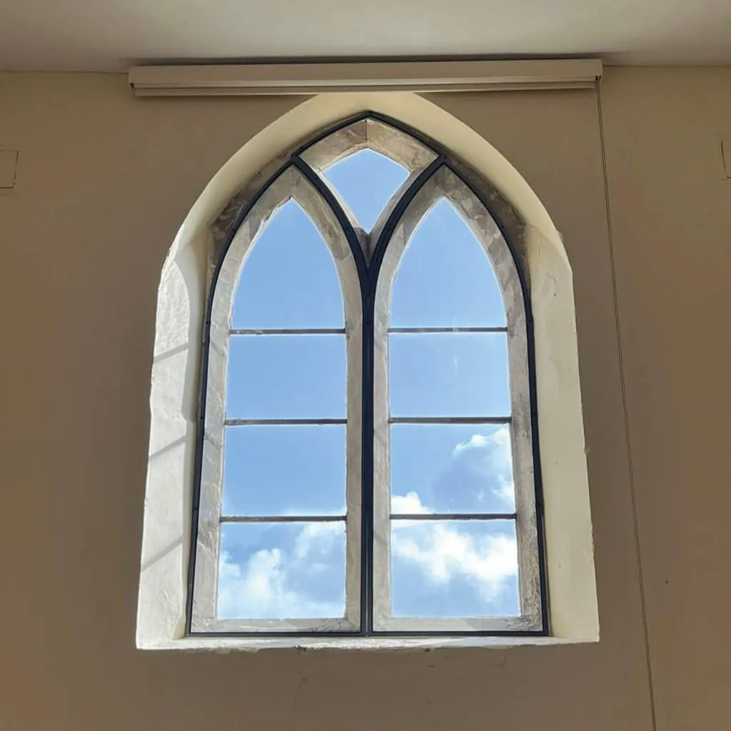 The team installed 12 shaped slimline units and 3 slimline units, all in a bespoke dark grey colour to fit the stone window surrounds. The team installed 12 shaped slimline units and 3 slimline units, all in a bespoke dark grey colour to fit the stone window surrounds.